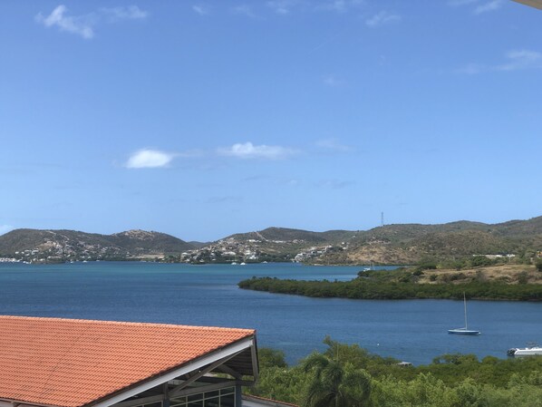 Balcony view of the water.  Can you feel the breeze and smell the salty air?