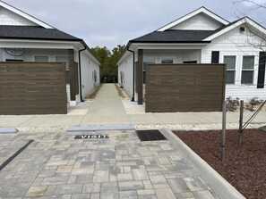 The 'back' of the duplex and designated parking space. 