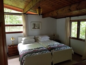 Spacious primary bedroom king bed or two twin beds with build-ins