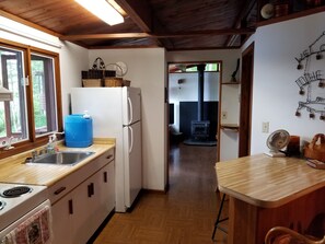 Well appointed with amenities for cooking / entertaining, walk out to garden BBQ