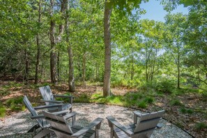 Sit back and relax in the serene backyard