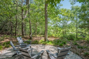 Sit back and relax in the serene backyard
