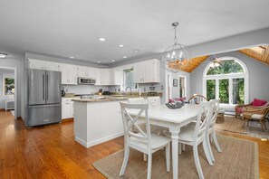 Open concept kitchen and dining area