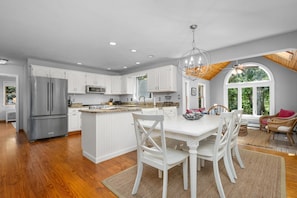 Open concept kitchen and dining area