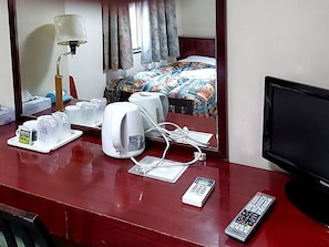 There is plenty of room for computer work on the large table.