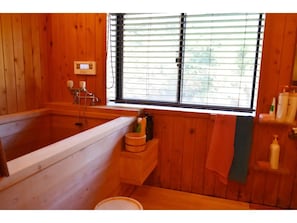 Relax in a large cypress bathyou can relax in big bathtub made by Japanese special wood.