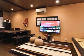 65-inch 4K flat-screen TV (compatible with entertainment features such as Netflix and YouTube)
