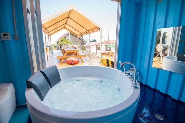 jacuzzi bath. Liquid soap for bubble bath is also available free of charge.