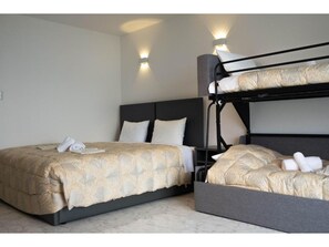 King and bunk beds. there are two rooms