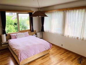 ・[Bedroom] The master bedroom is impressive with beautiful flooring and natural lighting from the windows.