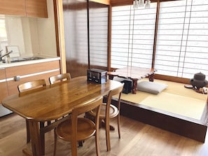 A kitchen and a Japanese-style room.