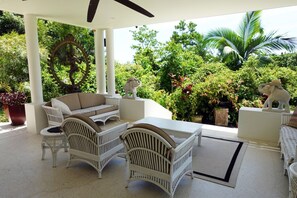 Your own Raffles verandah overlooking 2 private acres!