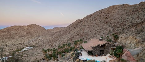 49 Palms Park Place on a mountainside overlooking city and National Park