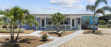 Newly Renovated Duplex in the heart of downtown Cocoa Beach!  This is our Turtle building, upon arrival you will be greeted by a beautiful turtle swimming in a crystal blue ocean!  Perfect to help you get into being on Island Time!!