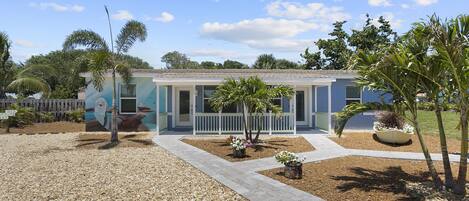 This is our Dolphin Building, 215 & 217.  There is 1 parking space for each unit.  Each unit is 2 bedrooms, 1 bathroom with a living room, kitchen and back yard.  The yards are connected with a gate between the units.