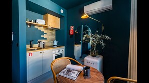 Nicely equipped kitchenette with a coffee machine, toaster, stove, kettle, and an oven-microwave for your homecooked meals! #kitchen #cooking
