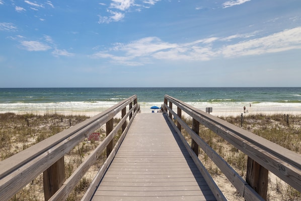 Enjoy the convenience of private beach access just steps away, <1 minute walk.