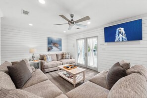 Spacious Living Room With Smart TV