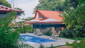 Pool area with lounge chairs