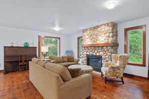 Living Room - Gather around the fireplace place and spend time with family and friends