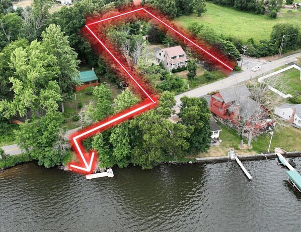 BELL HOUSE  Drone shot with property lines and an arrow to show you, your private dock in the Lake! ✨