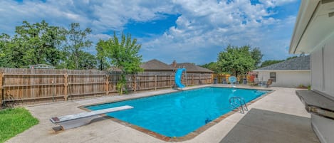 10 feet deep, 1500 square foot pool! We have a diving board and waterslide.
