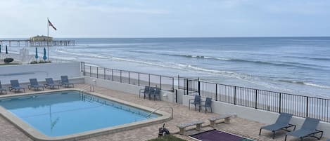 Heated Pool with chairs and direct beach access