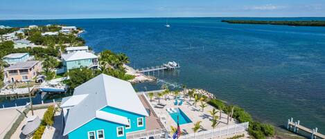 From Castaway On The Keys, the Gulf of Mexico stretches out in the distance, a mesmerizing expanse of azure waters that adds a touch of tranquility.