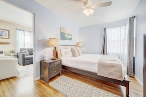 Super comfy queen bed with plenty of light. Blackout curtains darken the room when you want to sleep in.