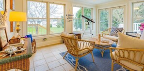 The airy, spacious feeling created in every space welcomes the entire group to gather, disconnect & reconnect! Enjoy water views throughout this charming retreat.