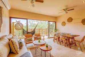 Floor-to-ceiling doors give access to your private balcony