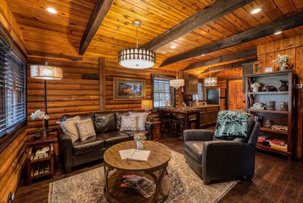 First look of open cozy living room from walking through the front door
