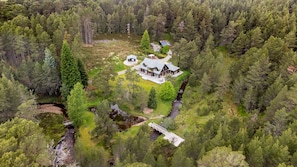 Baddengorm Lodge in woods arial picture