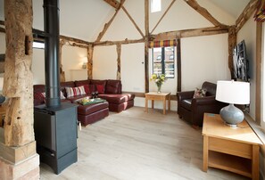 Evenwood Gables, Shropshire: Sitting room with wood burning stove