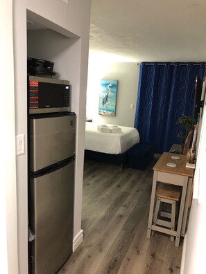 Refrigerator and microwave/air fryer 
