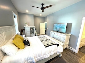 Master bedroom with 55 inch smart TV, Serta mattress and on suite bathroom.