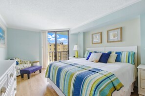 Primary bedroom with a king-size bed.