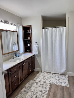 Master Bathroom with a walk in shower and plenty of counter space.