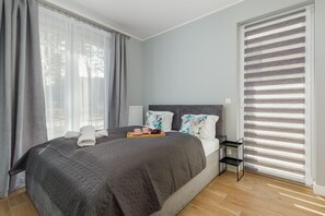 The cosy bedroom features a luxurious double bed.