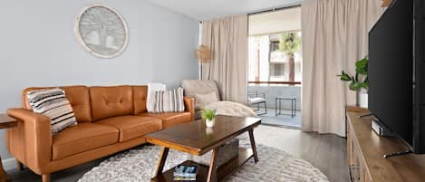 Livingroom space w/ view to balcony