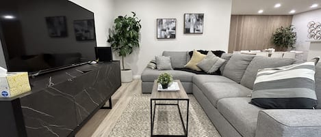 Comfort yourself with these soft and professionally cleaned sofas and Flat screen TV.