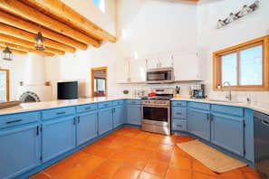 Full kitchen with modern appliances