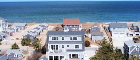 View of the rear of the house with views of Cape Cod Bay