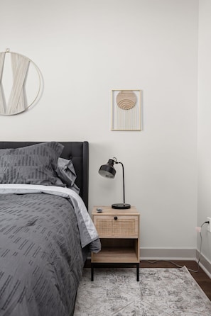 Simple and contemporary features in this spacious bedroom