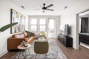 A gorgeous living area with no lack of natural light and perfectly fitting features!