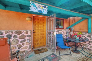 Front Entry | Outdoor Seating + Dining Area | Shared Hot Tub