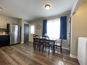 Full feature eat in kitchen. Dishwasher, microwave, stove.