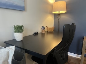 Desk with AC and USB charging outlet.