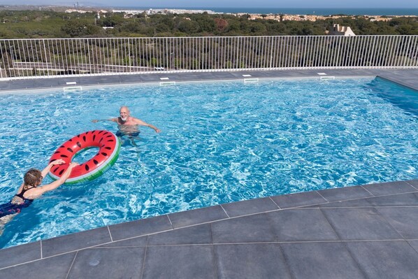 You'll love our outdoor swimming pool.