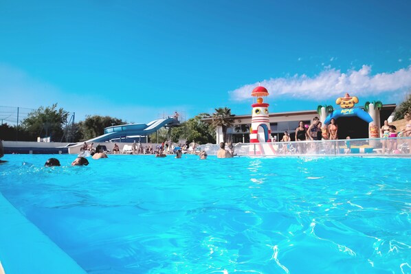 Splashes and smiles in a lively pool